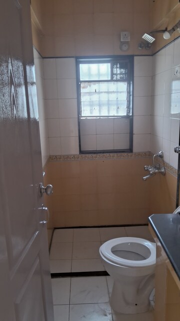 Bathroom in 2 BHK Apartment at Prajapati Park, Kopar Khairane – for Rent
