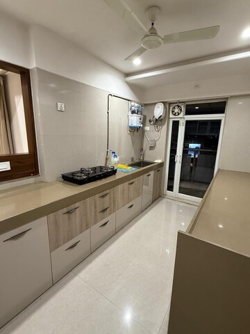 Kitchen in 2 BHK Apartment at Hiranandani Bloomingdale, Ghodbunder Road – for Rent