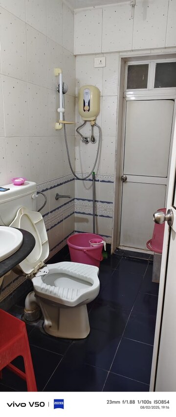 Bathroom in 2 BHK Apartment at Jasmine Tower, Vasant Vihar – for Rent