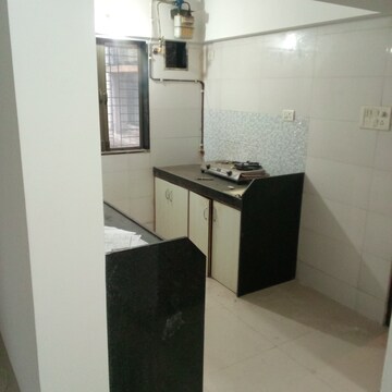 Kitchen in 1 BHK Apartment at Sethia Green View, Goregaon West – for Rent