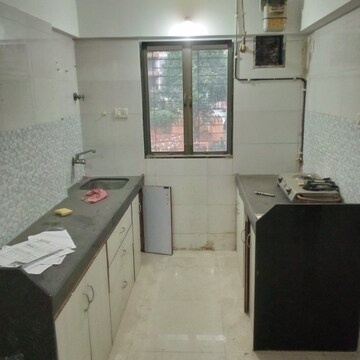 Kitchen in 1 BHK Apartment at Sethia Green View, Goregaon West – for Rent