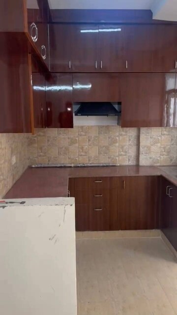 Kitchen in 2 BHK Apartment at Amrapali Golf Homes, Sector 4 Greater Noida – for Rent