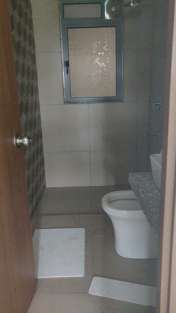 Bathroom in 2 BHK Apartment at Kalpataru Immensa, Kolshet Road – for Rent