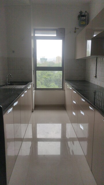 Kitchen in 2 BHK Apartment at Kalpataru Immensa, Kolshet Road – for Rent