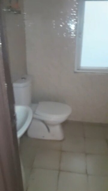 Bathroom in 2.5 BHK Apartment at Wave City, Wave City – for Rent