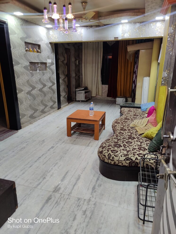 Living Room, madhumita-apartment-gururaj-society 2 Bedroom 700 Sq.Ft. Apartment In Kothrud Pune 9079012