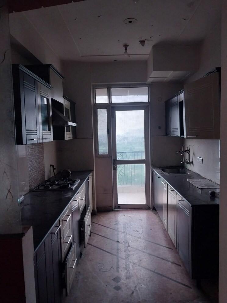 Kitchen, prateek-the-royal-cliff 3.5 Bedroom 1985 Sq.Ft. Apartment In Sain Vihar Ghaziabad 9079056