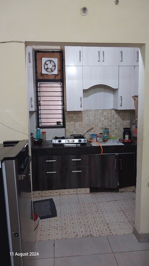 Kitchen in 3 BHK Apartment at Zeta I Greater Noida – for Sale