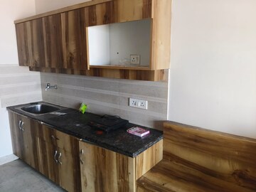 Kitchen in 1 BHK Apartment at Paramount Golfforeste, Zeta I Greater Noida – for Rent