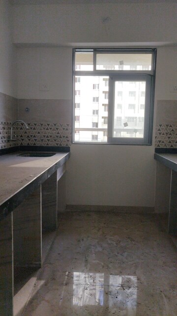 Kitchen in 1 BHK Apartment at Squarefeet Ace Square phase 2, Ghodbunder Road – for Rent