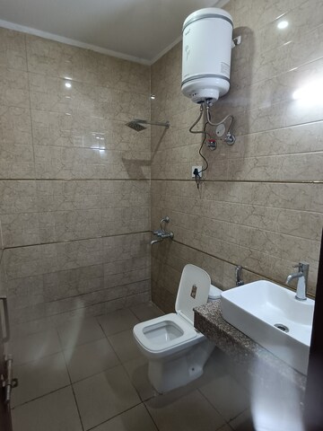 Bathroom in 3 BHK Builder Floor at Ansal API Esencia, Sector 67 – for Rent