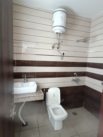 Bathroom in 3 BHK Builder Floor at Ansal API Esencia, Sector 67 – for Rent