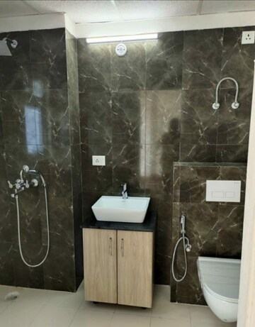 Bathroom in 1 BHK Apartment at Mahadev Apartments Noida, Sector 73 – for Sale