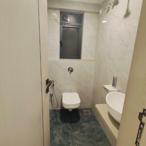 Bathroom in 1 BHK Apartment at Gurukrupa Divyam, Naidu Colony – for Sale