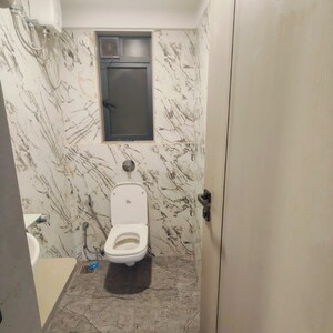 Bathroom in 1 BHK Apartment at Gurukrupa Divyam, Naidu Colony – for Sale