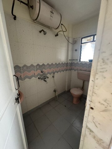 Bathroom in 2 BHK Apartment at Koteshwar Niwas CHS, Vile Parle East – for Rent