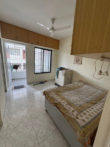 Bedroom in 2 BHK Apartment at Koteshwar Niwas CHS, Vile Parle East – for Rent