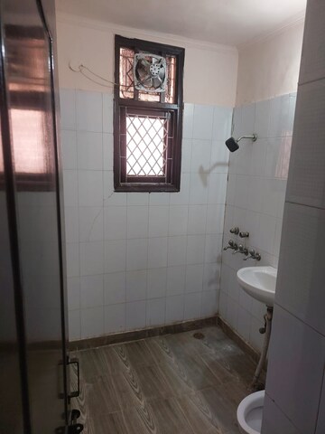 Bathroom in 4 BHK Builder Floor at Sector 37 – for Rent