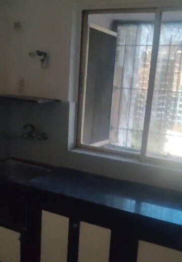 Kitchen in 2 BHK Apartment at Grenville CHS, Andheri West – for Rent