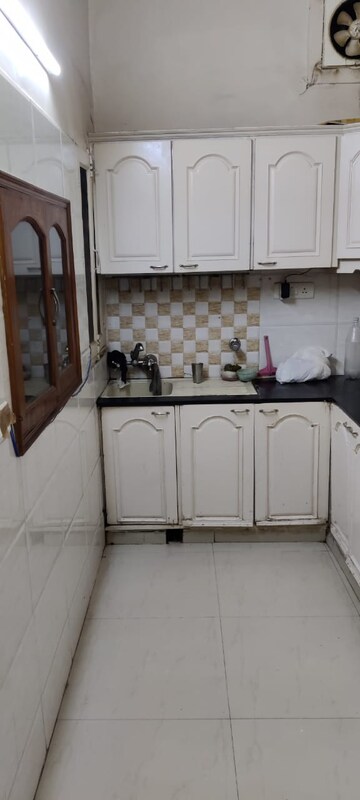 Kitchen in 3 BHK Apartment at Alaknanda Apartment Block F, Surya Nagar – for Rent