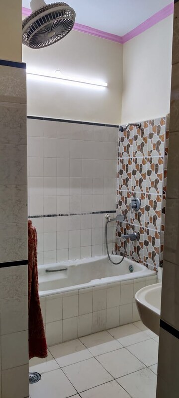 Bathroom in 3 BHK Apartment at Alaknanda Apartment Block F, Surya Nagar – for Rent