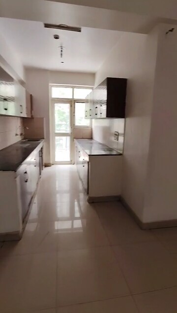 Kitchen in 3 BHK Apartment at Panchsheel Wellington, Dundahera – for Rent