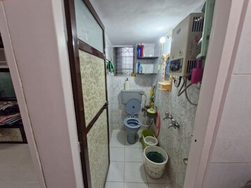 Bathroom in 1 RK Apartment at Mauli Darshan CHS, Dahisar West – for Rent