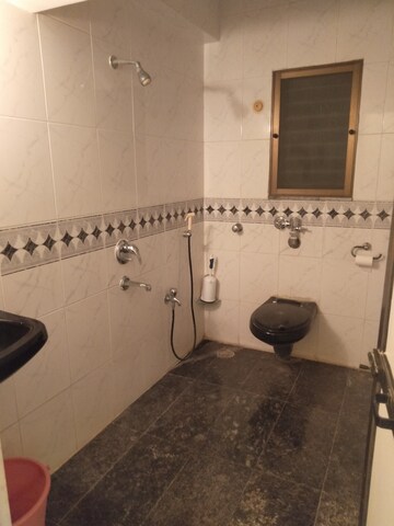 Bathroom in 2 BHK Apartment at Golden Square, Santacruz East – for Rent