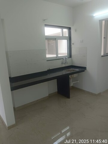 Kitchen in 2 BHK Apartment at Jhamtani Ace Abode, Kiwale – for Rent