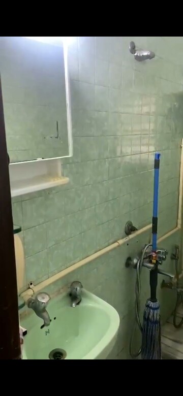 Attached Bathroom in 1 BHK Apartment at Poornima Apartments, Colaba – for Rent