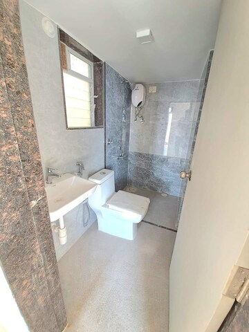 Bathroom in 1 RK Apartment at Sai Aashirwad CHS, Virar West – for Sale