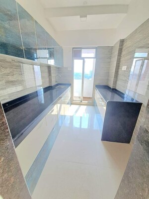 Kitchen in 1 RK Apartment at Sai Aashirwad CHS, Virar West – for Sale