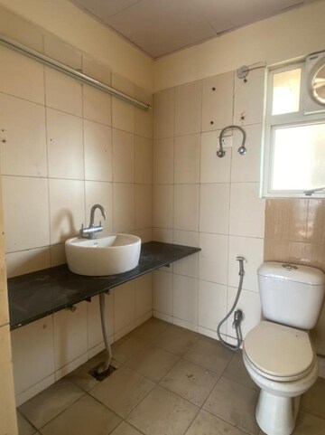 Bathroom in 3 BHK Apartment at Landcraft Golf Links, Pandav Nagar – for Sale