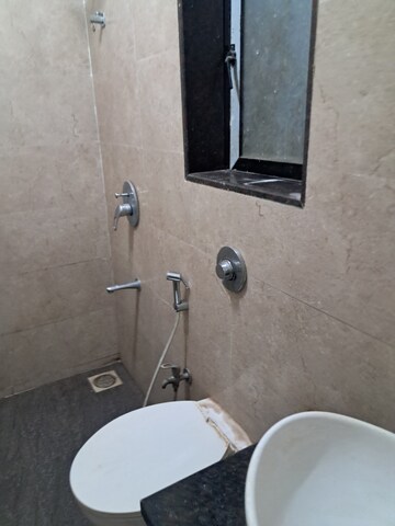 Bathroom in 2 BHK Apartment at Sripad Garden View, Ghatkopar East – for Rent