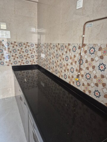 Kitchen in 2 BHK Apartment at Samrin Heritage, Panch Pakhadi – for Rent
