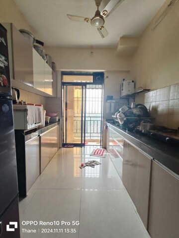 Kitchen in 2 BHK Apartment at Shree Nandanvan homes, Kalwa – for Rent