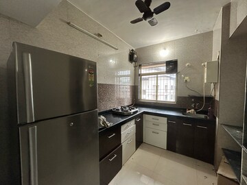 Kitchen in 2 BHK Apartment at Swastik Residency Phase II CHS Ltd, Pratha Pushp Society – for Rent