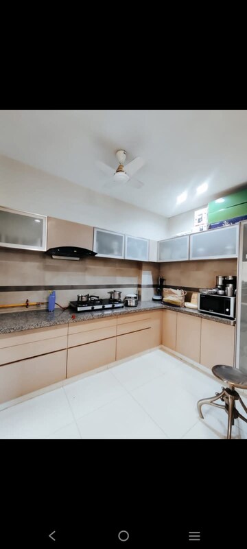 Kitchen in 3 BHK Apartment at Shivalik Sharda Park View, Shela – for Rent