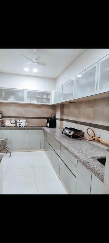 Kitchen in 3 BHK Apartment at Shivalik Sharda Park View, Shela – for Rent