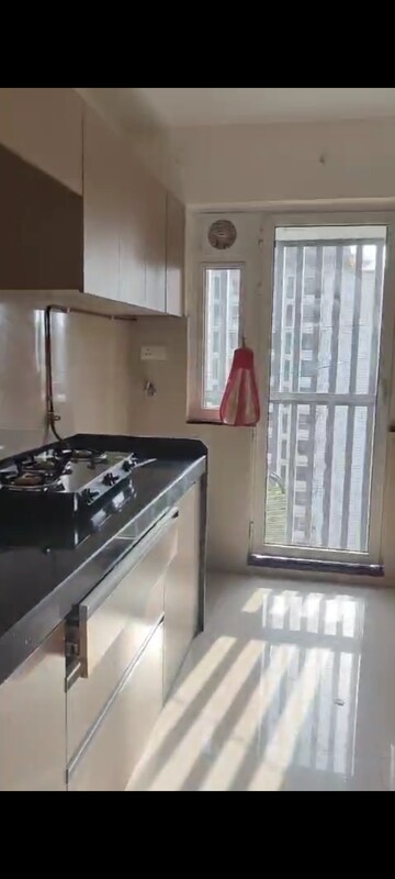 Kitchen in 2 BHK Apartment at Rustomjee Erika, Bandra East – for Rent