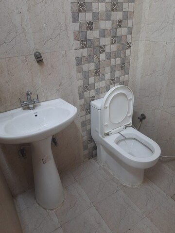 Bathroom in 2 BHK Apartment at Astha Lane Residents Welfare Association, Indrapuram – for Rent