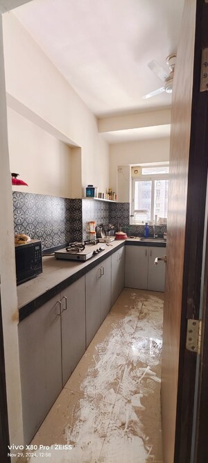 Kitchen in 2 BHK Apartment at Hubtown Greenwoods, Vartak Nagar – for Sale