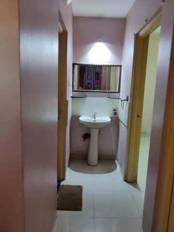 Bathroom in 2 BHK Apartment at Goel Ganga Orchard, Mundhwa – for Rent
