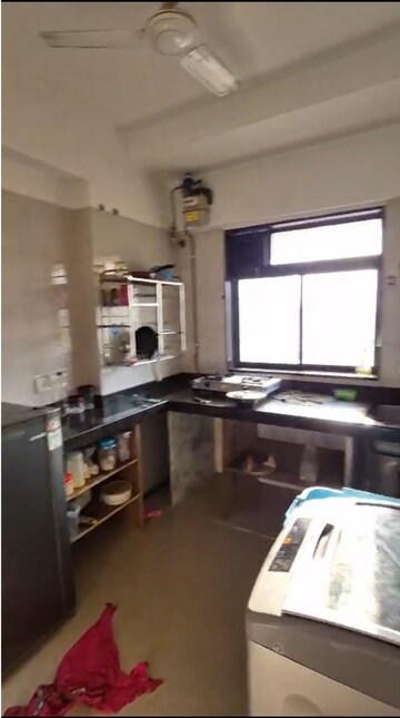 Kitchen in 2 BHK Apartment at Neminath Silver Oak, Andheri West – for Rent
