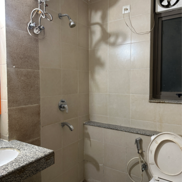 Bathroom in 2 BHK Apartment at Unitech Uniworld Gardens 2, Malibu Town – for Rent