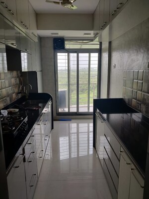 Kitchen in 2 BHK Apartment at Moreshwar 19 East, Nerul – for Sale