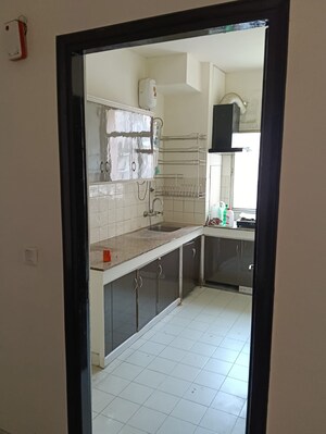 Kitchen in 2 BHK Apartment at DLF The Royalton Tower, Dlf Phase V – for Sale