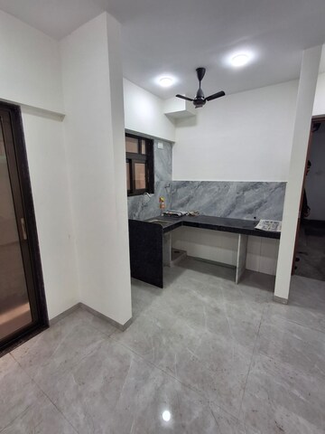Kitchen in 2 BHK Apartment at Commercial Chandra Darshan Heights, Chinchpokli – for Sale