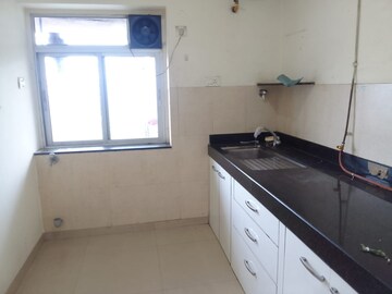Kitchen in 2 BHK Apartment at Kalpataru Hills, Manpada – for Sale