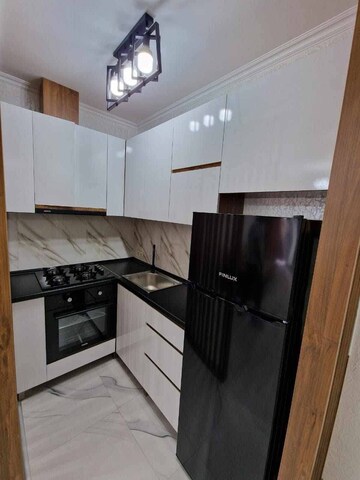 Kitchen in 2 BHK Villa at Vasant Vihar – for Sale